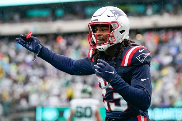 New England Patriots safety Kyle Dugger agrees with an official during the second half an NFL game against the New York Jets on Sunday, Sept. 24, 2023 in New York. (AP Photo/Bryan Woolston)
