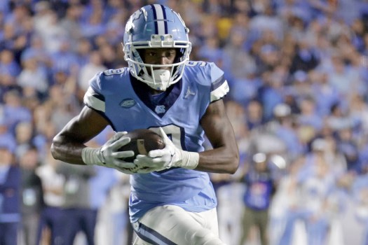 North Carolina wide receiver Devontez Walker (9) runs for a touchdown following a reception during the second half of an NCAA college football game against Miami, Saturday, Oct. 14, 2023, in Chapel Hill, N.C. (AP Photo/Chris Seward)
