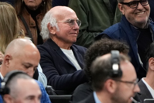 Actor Larry David watches from the stands as UConn and Illinois warm up prior to the first half of the NCAA Tournament game at the TD Garden in Boston on Saturday. (AP Photo/Michael Dwyer)