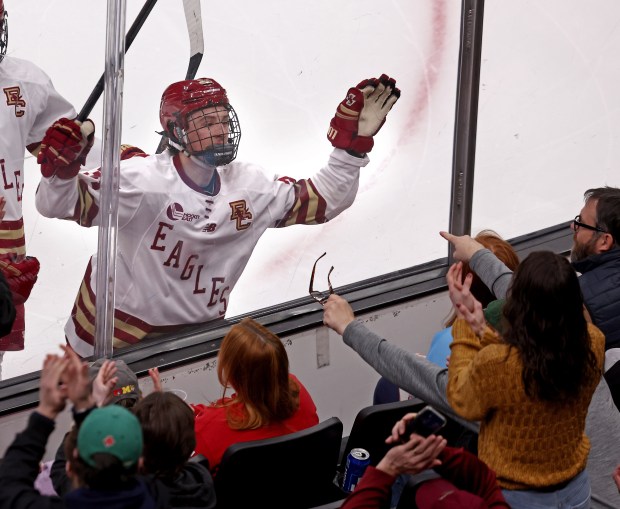 Boston College forward Gabe Perreault celebrates his goal with the fans during an 8-1 win over UMass at the TD Garden. (Staff Photo/Stuart Cahill/Boston Herald)
