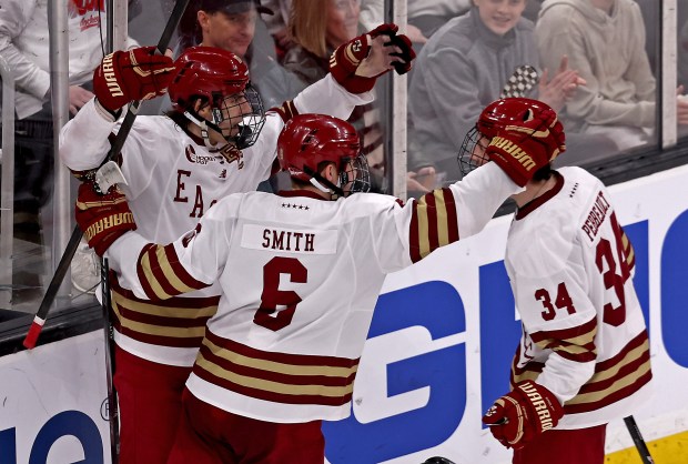 Boston College forward Cutter Gauthier celebrates his goal with Will Smith and Gabe Perreault during BC's 6-2 win over BU in the Hockey East title game Saturday. (Staff Photo/Stuart Cahill/Boston Herald)
