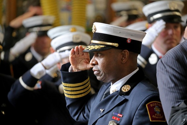BFD Rodney Marshall, Chief of Operations Support, salutes during a memorial for firefighters that lost their lives 10 years ago at the 298 Beacon Street fire. (Staff Photo By Stuart Cahill/Boston Herald)
