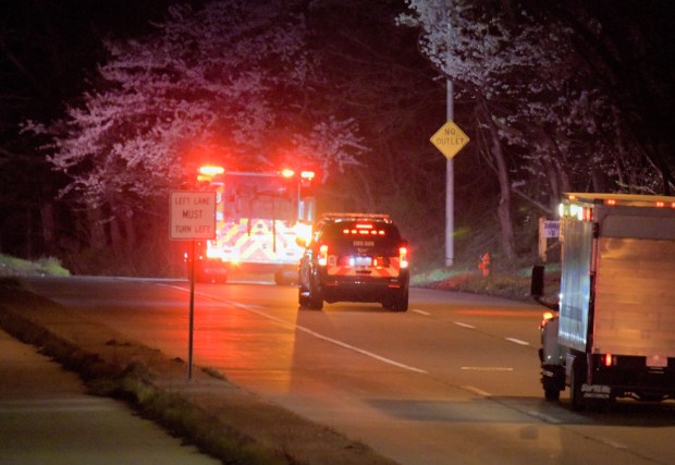 Emergency crews head toward Fort Armistead after the Francis Scott Key Bridge collapsed into the Patapsco River after a container ship collided with the structure overnight. (Karl Merton Ferron/Staff)