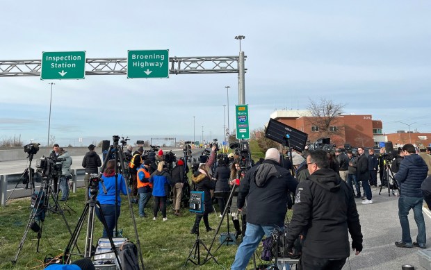 Media members wait for Gov. Wes Moore and other officials to arrive for a news conference after the Francis Scott Key Bridge collapsed early Tuesday morning when it was struck by a vessel. (Barbara Haddock Taylor/Staff)