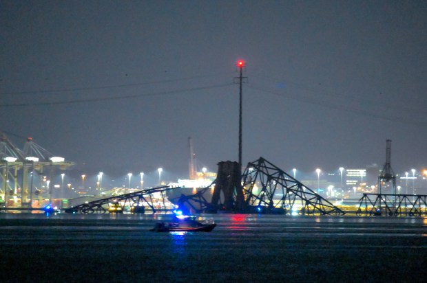 Baltimore's Francis Scott Key Bridge collapsed early Tuesday morning after a support column was struck by a vessel. (Karl Merton Ferron)