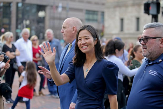 Mayor Michelle Wu marches with City Council President Ed Flynn as Boston celebrates with its Veteran's Day Parade on November 5, 2022 in , BOSTON, MA. (Stuart Cahill/Boston Herald)